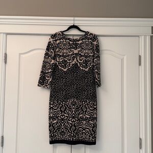 Gabby Skye Elegant Black and Cream Patterned Dress
